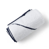 malabar baby's silky soft bamboo cotton hooded baby and toddler towel. Shown in navy blue. The towel has a detailed pom pom trim. Perfect for bath time and the pool/beach.